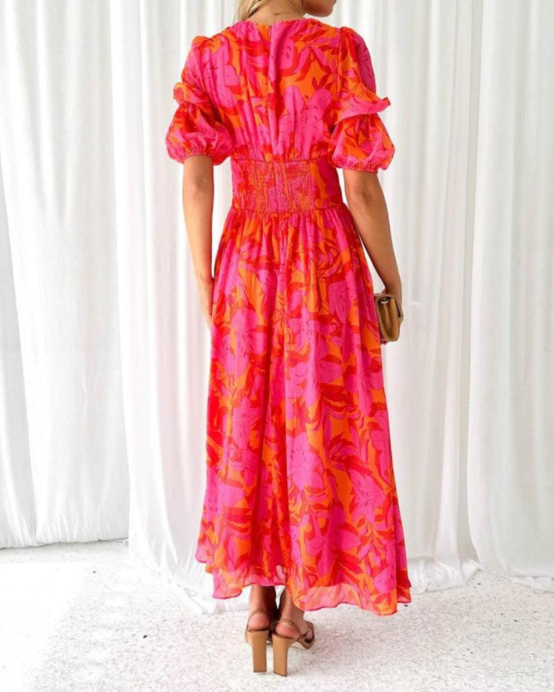 Lydia | Robe longue fluide à manches bouffantes et imprimé floral.